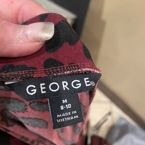 Skirt George  94% polyester 6% spandex size medium